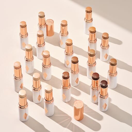 BASE DE MAQUILLAGE HIDRATANTE EN BARRA UNREAL SKIN SHEER GLOW TINT 10 TAN