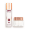 DUO DE CHARLOTTE'S MAGIC CREAM Y SPRAYS FIJADORES: SET DE CUIDADO DE LA PIEL Y MAQUILLAJE